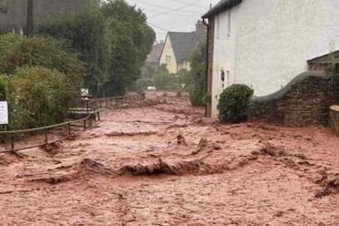 A road became a raging muddy river through Withypool on Sunday.
