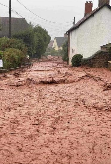 A road became a raging muddy river through Withypool on Sunday.