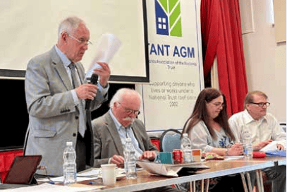 West Somerset's Peter Bate chairs a previous annual meeting for National Trust tenants.