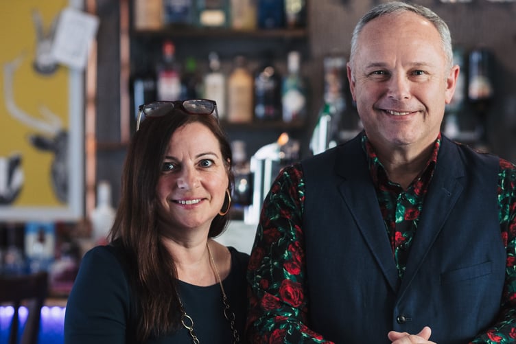 Dunster Castle Hotel owners John and Lisa Richardson have decided to stay put and have taken the property off the market.