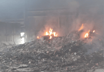 Fires continue to burn in devastated recycling centre