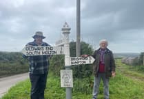Volunteers restore damaged iconic road signs in Exmoor National Park