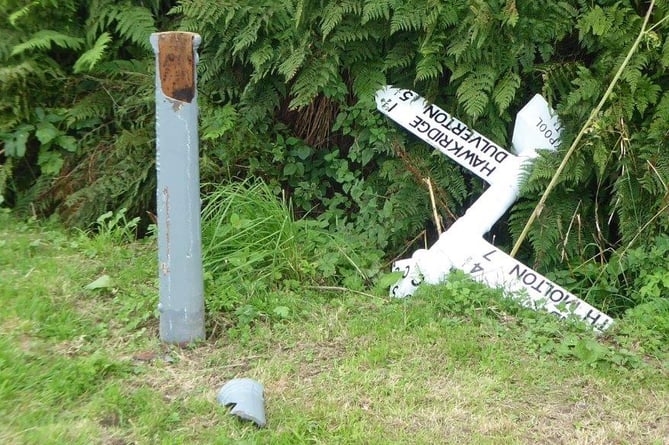 The damaged Withypool fingerpost.