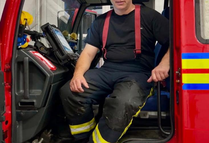 Retiring Nether Stowey fireman Richard Nurton receives a long service certificate from DSFR group commander Simon Young.