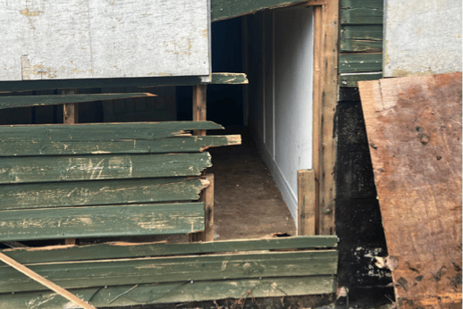 Vandalism can clearly be seen in the existing wooden Hurlstone Bungalow, in Bossington.