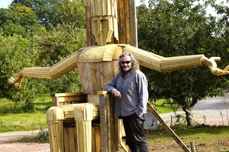 Artist Rob Heard with his 'Torm Man' sculpture which will be set alight on Saturday.