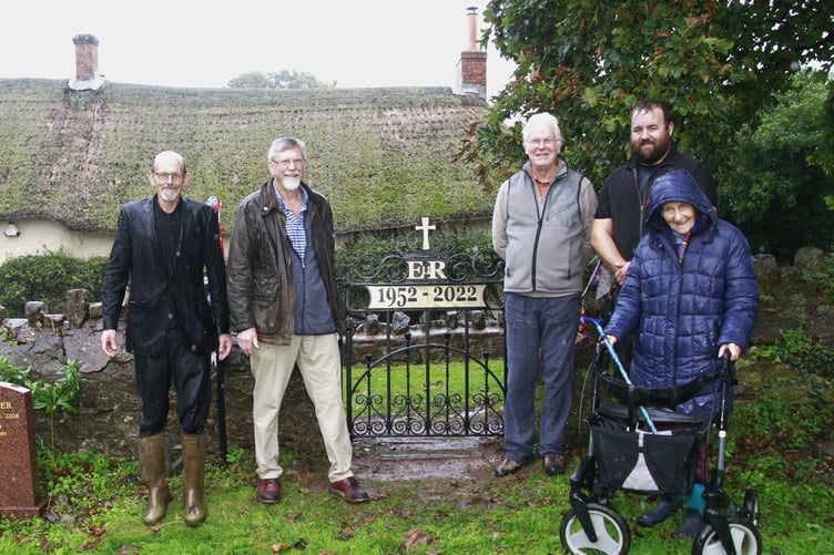 Members of Bicknoller’s memorial gate committee at its unveiling, chairman Marian Gresswell, treasurer Alastair Gresswell, secretary Kim Martin, and communications officer Philip Comer, with blacksmith Kyle Roberts.