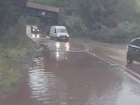 Flood partially closes main road