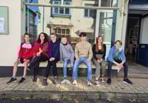Pop up shop where customers pay with plastic pledges