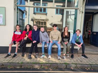 Pop up shop where customers pay with plastic pledges