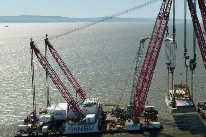 Water intake heads being lowered in the Bristol Channel for the Hinkley Point C nuclear power station project.