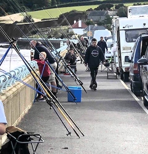 Fishing equipment on the seafront pavement in Blue Anchor.