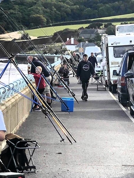 Fishing equipment on the seafront pavement in Blue Anchor.