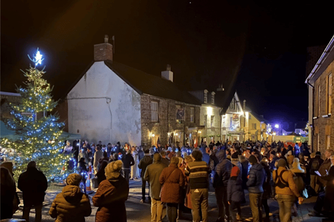 Carol Singing in Bank Square at last year's Dulverton by Starlight festival.