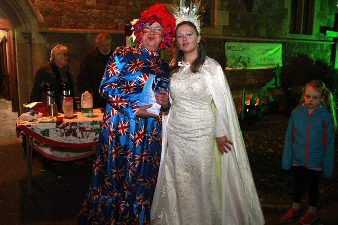 Panto people Clive Longhurst as Batty Bridget and Penny Williams as the Snow Queen at Minehead's Christmas lights switch-on.