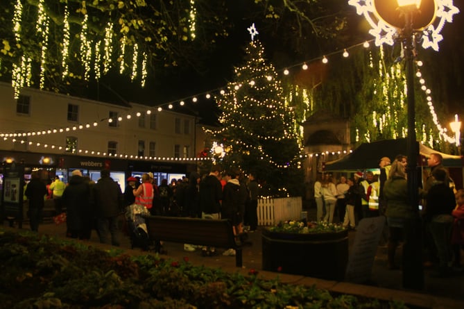 Minehead's Christmas lights were switched on during a Victorian late-night shopping event.