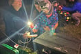 Four-year-old Charlie switches on orchard lights