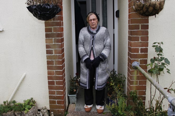 Shirley Fountain wraps up in layers of clothing to stay warm in her Brushford bungalow.
