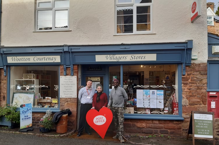 Post Office area manager Lewis Bright (left) with Wootton Courtenay's PO and shop managers Sarah Fox and Mark Burgess.