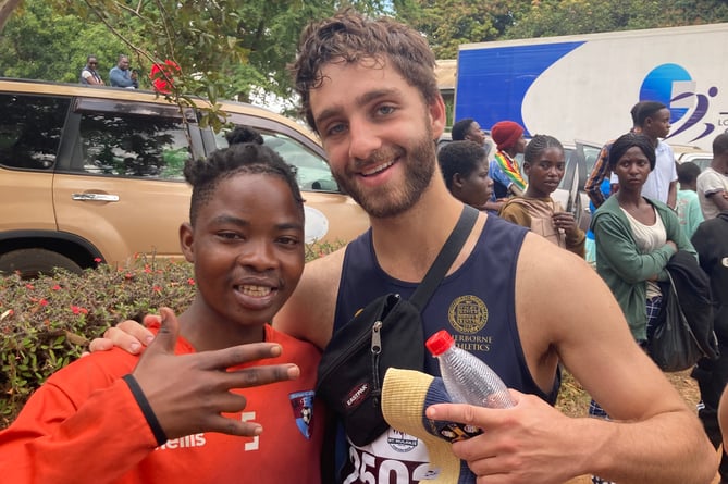 Seb (right) after running Mt Mulanje Porters Race in Malawi.