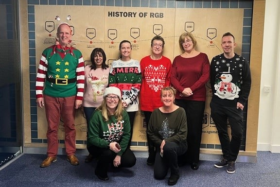 RGB managing director Jenny Naylor (front, left) with staff in Christmas jumpers to support the Children's Hospice South West.