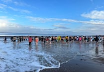 New Year's Day sea dippers raise £5.5k