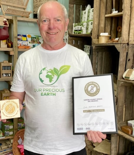 Keith Hunt, whose Minehead shop Our Precious Earth, has won recognition from retail entrepreneur Theo Paphitis.