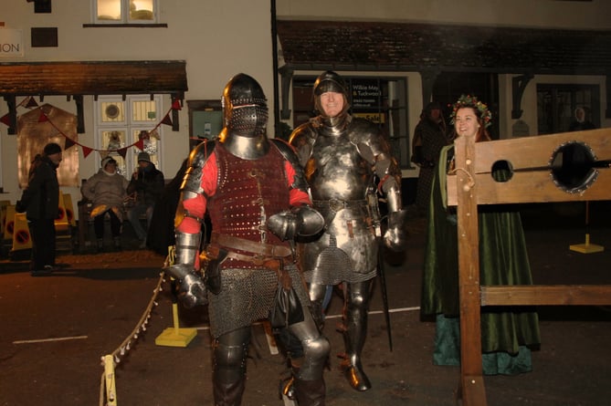 Knights at the stocks during last month's festival.