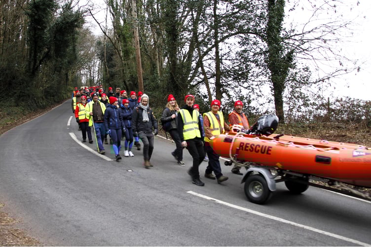 The overland lifeboat launch re-enactment descends Porlock Hill.