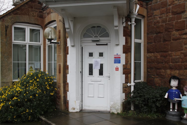 A note on the front door of Minehead Medical Centre on Tuesday.