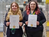 Apprentices Maddi and Poppy eye optical careers