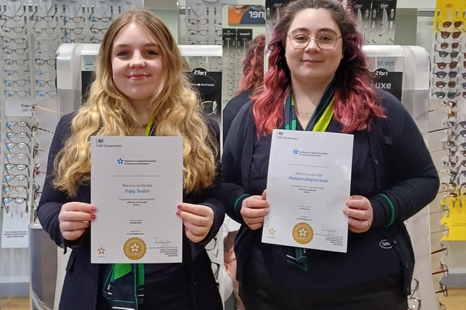 Specsavers Minehead apprentices Poppy Boulton (left) and Maddison Stanford Smith with their qualifications.