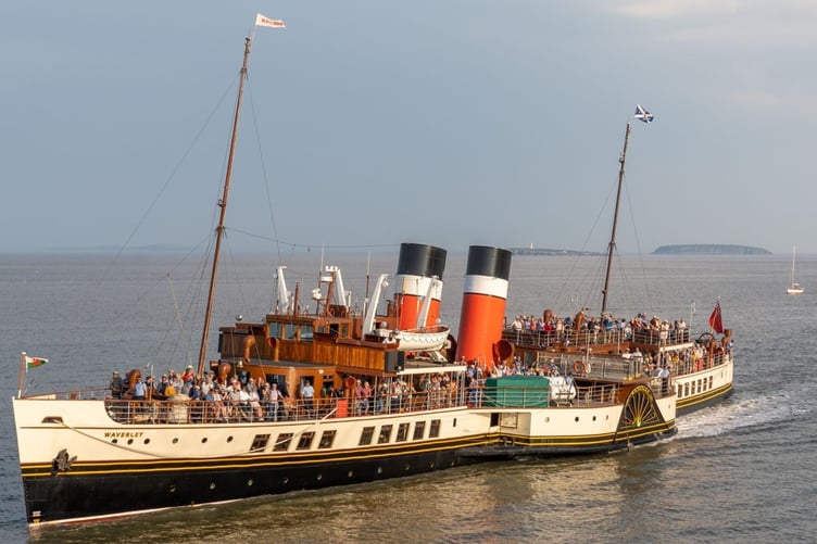 The Waverley in the Bristol Channel with Steep Holm and Flat Holm behind it.