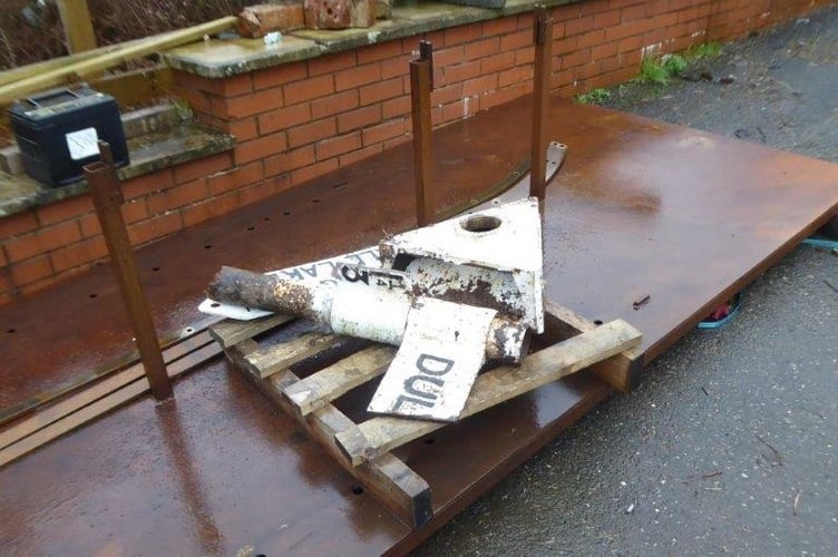 Parts of Exmoor's damaged Beech Tree Cross fingerpost recovered by volunteer Jeremy Davies.
