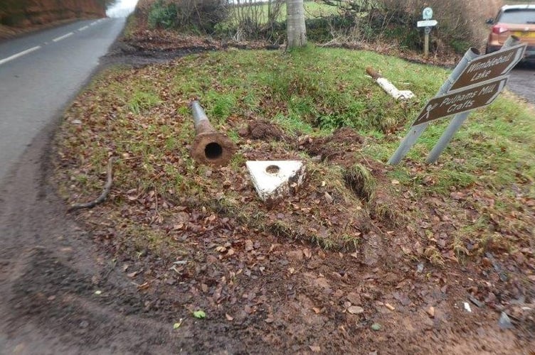 The remains of Beech Tree Cross fingerpost, on Exmoor, after apparently being knocked down by a vehicle.