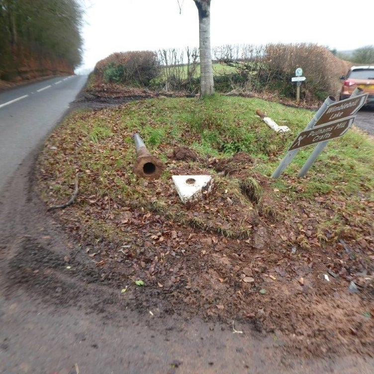 The remains of Beech Tree Cross fingerpost, on Exmoor, after apparently being knocked down by a vehicle.