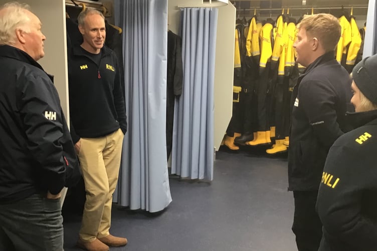 RNLI chief executive Mark Dowie (left) with area lifesaving manager Phil Hill and helms Harry Mouzouri and Karla Thresher.