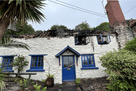 One of the Porlock Weir thatched cottages destroyed in a fire last year.