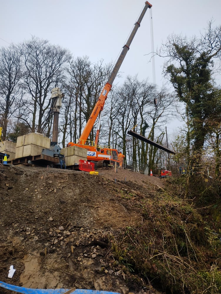 A 50-tonne crane at work repairing a B3224 embankment on Exmoor.