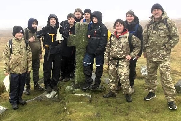 The youngsters practised a variety of hiking and navigation skills in the mist and rain.