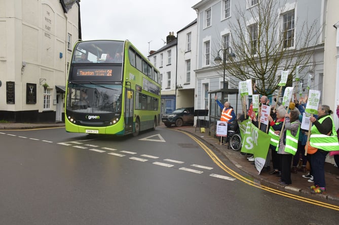 The No 25 Taunton via Wiveliscombe and Bampton to Dulverton bus makes its way past protesters on Saturday.
