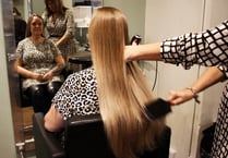Donna's long hair cut to help cancer charity