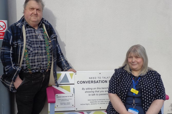 Minehead Hospital's conversation bench has been refurbished by Tony Berry, who is pictured with Roz Smith, of the hospital's general office team.