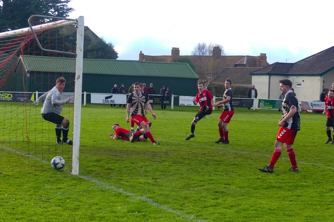 Josh Aspey scores his second goal to give Watchet the lead