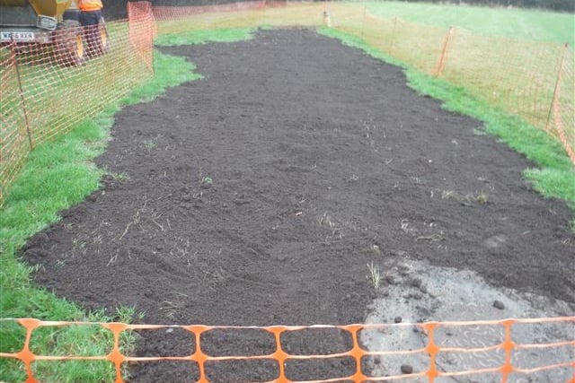 The sewage pipe manhole cover and the polluted area of the field in Timberscombe was cordoned off as Wessex Water investigated.