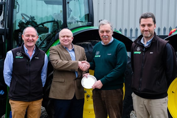 Representatives from John Deere have recognised the family-run dealership for their four decades of service