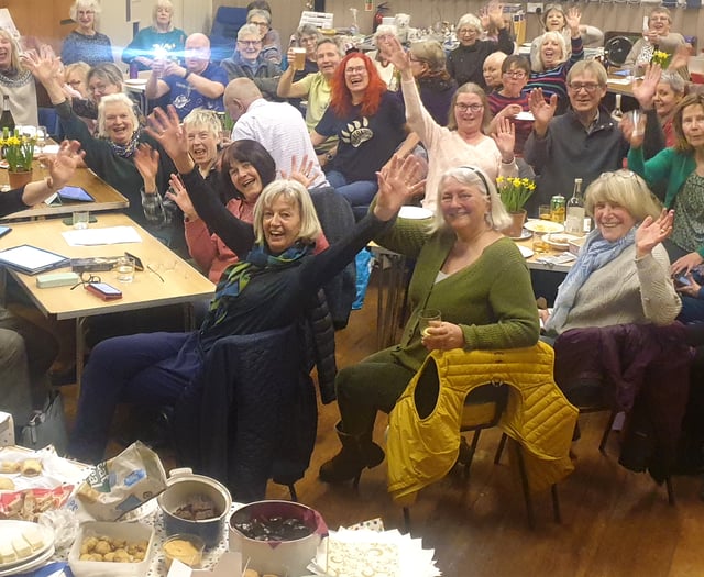 Minehead street choir sing for their supper