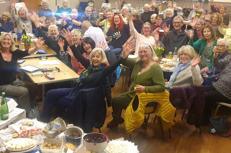Minehead street choir sing for their supper
