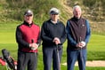 Golf club hand over two fat cheques 


