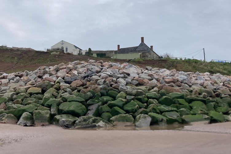 The Anchor's Drop public house, Blue Anchor, seen from the beach below.